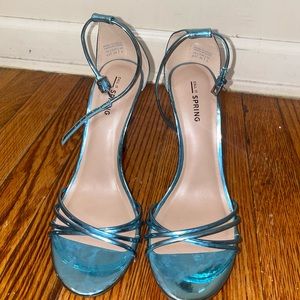 Blue strappy toe out heel sandals